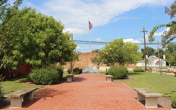 Brick walkway, benches and landscaped grounds at Veterans Park in Unadilla, Georgia