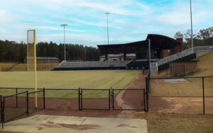 Baseball field, spectator stands and fencing at Little League Southeast Park in Warner Robins, Georgia
