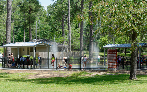 Splash pad with shade structures at Magnolia Springs State Park in Jenkins County, Georgia