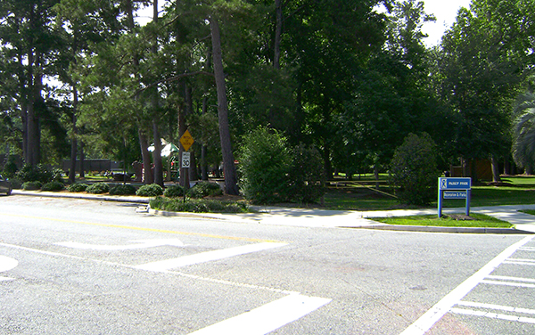 Tree-lined entrance to McKey Park at North Oak Street and Burton Street in Valdosta, Georgia