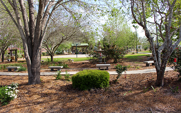 Landscaped Offerman Memorial Park with benches, pathways and mature trees in Pierce County, Georgia, featured by Bliss Products and Services