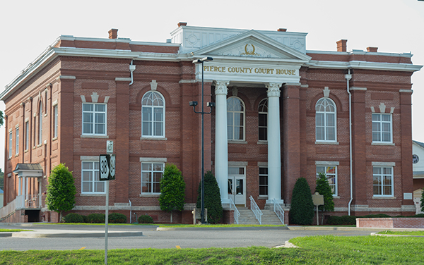 Brick Pierce County Courthouse with entrance columns in Blackshear, Georgia, featured by Bliss Products and Services