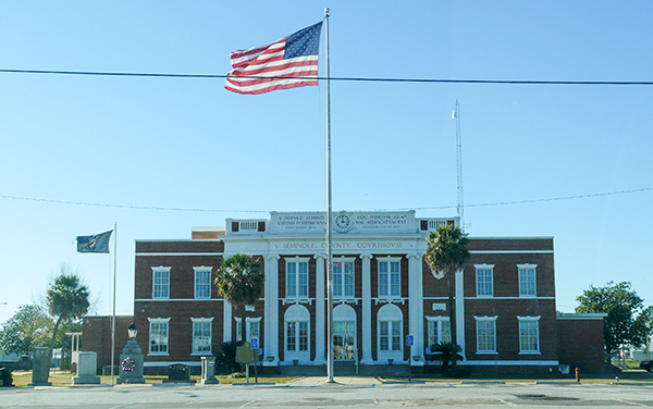Seminole County Courthouse with American flag in Donalsonville, Georgia