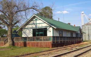 Historic Shellman Railroad Depot beside railroad tracks in Randolph County, Georgia