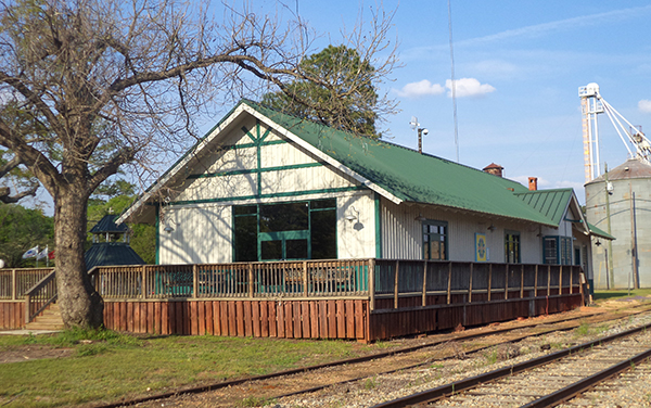 Historic Shellman Railroad Depot beside railroad tracks in Randolph County, Georgia