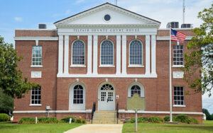 Telfair County Courthouse with red-brick facade and arched windows in McRae, Georgia