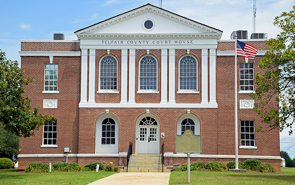 Telfair County Courthouse with red-brick facade and arched windows in McRae, Georgia