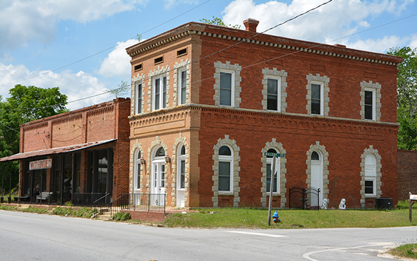 Historic red-brick commercial buildings in the Twin City Historic District of Emanuel County, Georgia