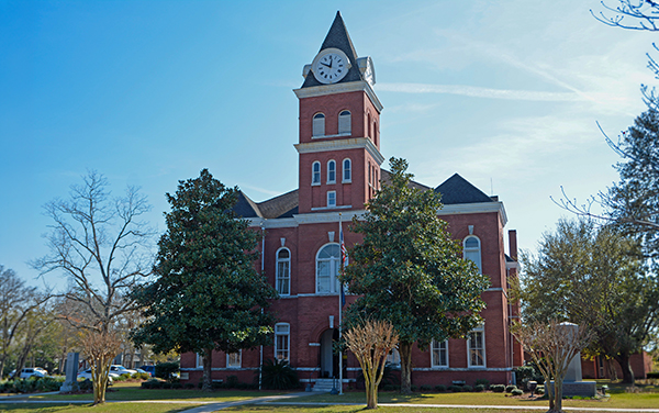The historic red-brick Wayne County
Courthouse in Jesup, Georgia, a 1903
Romanesque Revival building with a tall
clock tower