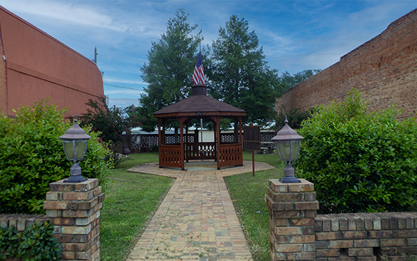 Brick walkway leading to a community gazebo at Whigham Community Park in Grady County, Georgia