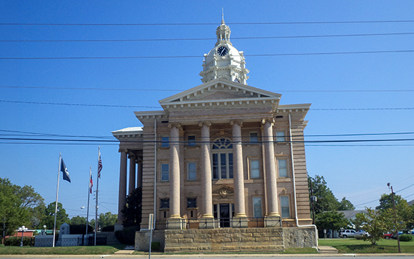 The historic Wilcox County Courthouse in
Abbeville, Georgia, a 1903 cream-brick
Neoclassical building with columns and a
clock tower