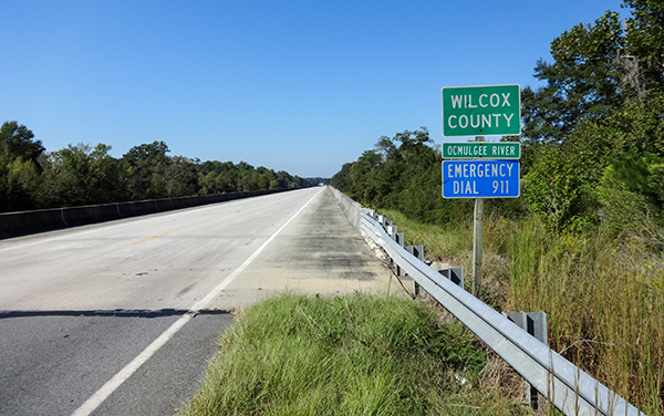 Highway signs marking the Wilcox County line
and the Ocmulgee River crossing on US-280 in
Georgia