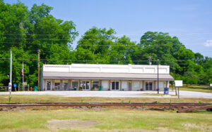 Bowersville Town Hall, post office, and community center beside the railroad tracks in Bowersville, Georgia.