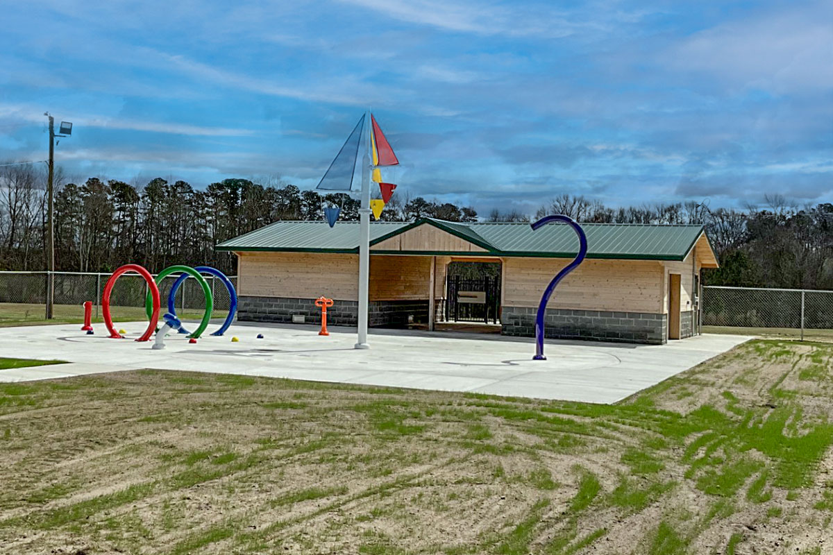 Splash pad with pavilion and restroom building at Clark Park in Tarboro, North Carolina
