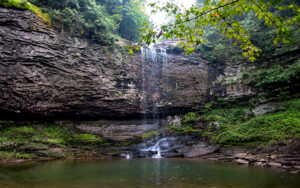 Cloudland Canyon waterfall in Dade County, Georgia, with rock walls, forest, water, and trail-based outdoor recreation setting.