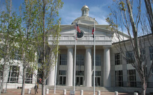 Douglas County Courthouse in Douglasville, Georgia, representing civic outdoor space planning for playgrounds, shade, seating, and park furnishings.