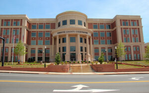 Modern Forsyth County Courthouse with landscaped steps and civic plaza in Cumming, Georgia