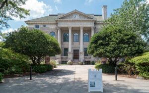 Historic DeKalb County Courthouse in downtown Decatur, Georgia with walkway, trees, and civic entrance