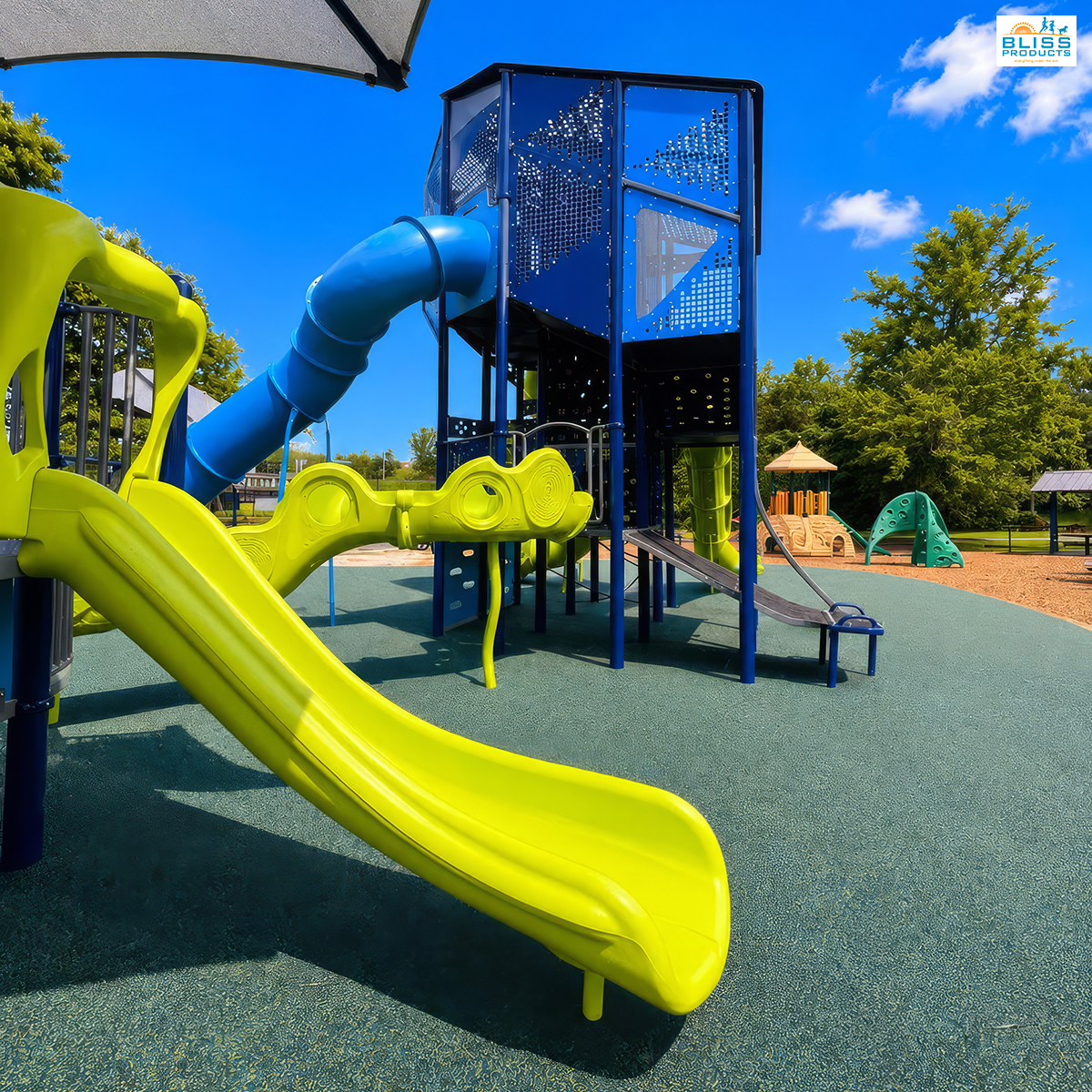 Lime-green open slide and Olympus Tower at Clay County Sports Complex in Hayesville, North Carolina.