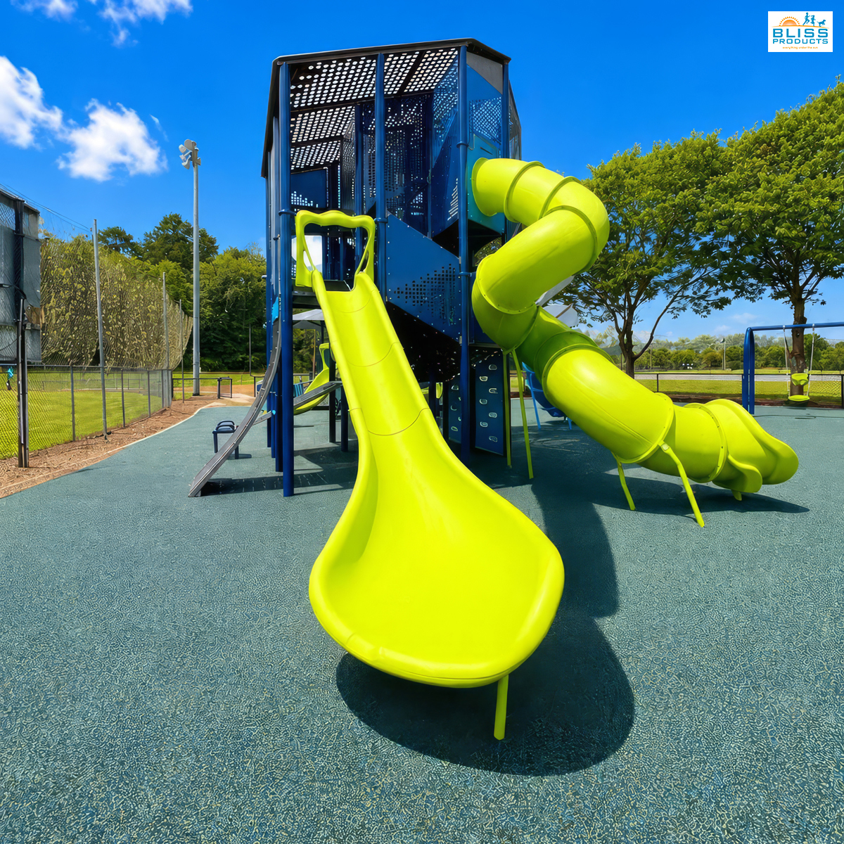 Lime-green open and enclosed slides on the Olympus Tower at Clay County Sports Complex in Hayesville, North Carolina.