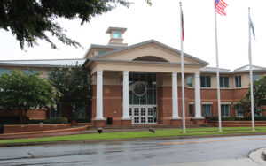 Smyrna Georgia City Hall in Cobb County, Georgia, with flags and civic building entrance.