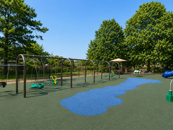Multiple playground swings over poured-in-place surfacing at Wills Memorial Park in La Plata, Maryland