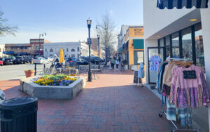 West Park Square in Marietta, Georgia, showing a walkable downtown sidewalk and civic shopping area in Cobb County.